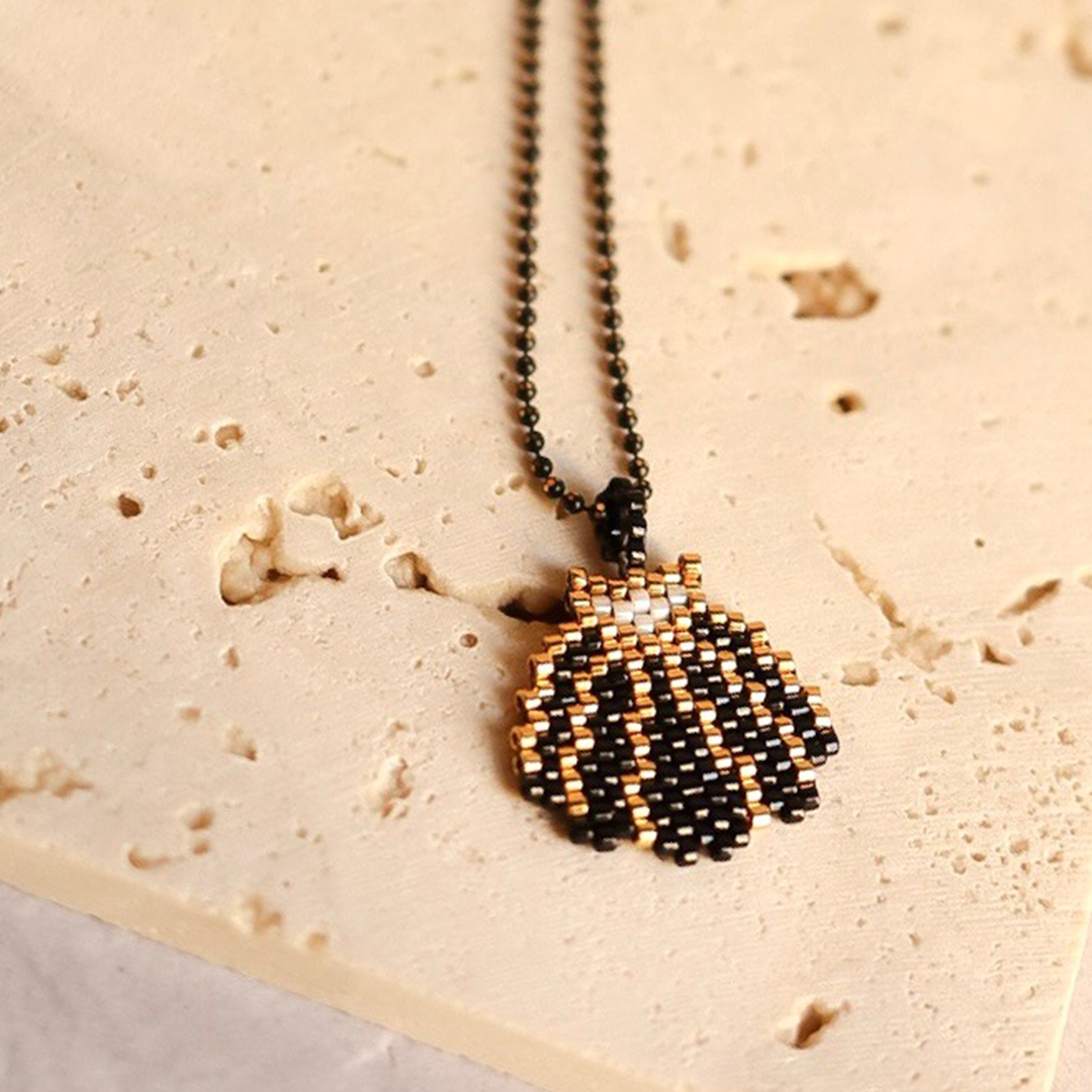 Handcrafted beaded shell